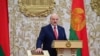 Belarusian President Alyaksandr Lukashenka takes the oath of office as president of Belarus during a swearing-in ceremony in Minsk on September 23, 2020. 